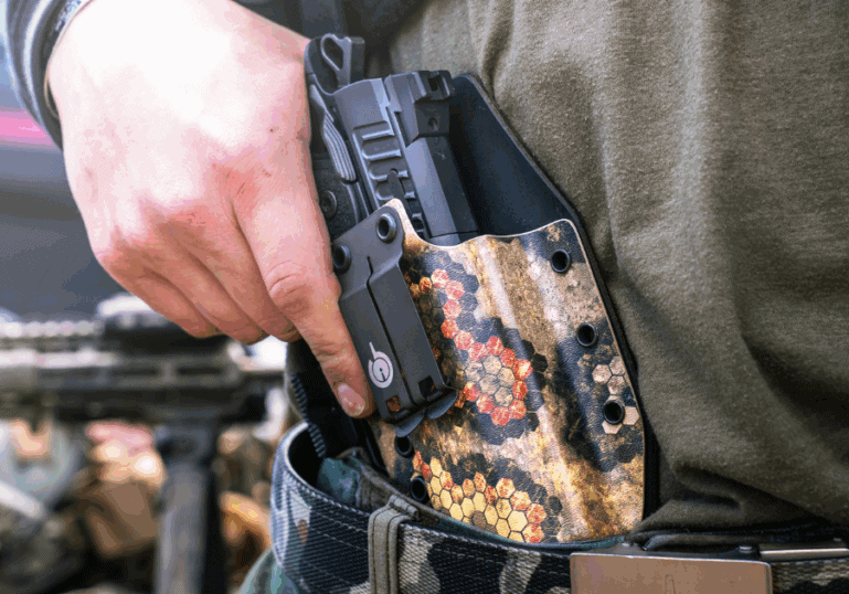 A first time gun owner using the Solace Holster by GunfightersINC.